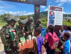 Satgas Yonif 762/VYS Melaksanakan Giat “Serbuan Senyum”