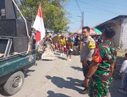 Babinsa bersama Tiga Pilar Lakukan Pengamanan Pawai Karnaval HUT RI 79