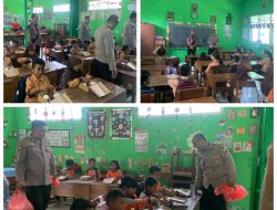 POLRES NGANJUK BAGIKAN MAKAN SIANG BERGIZI GRATIS DI SDN 1 WILANGAN