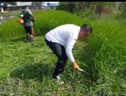 Kapolsek Krian Bersama Perangkat Desa Ponokawan Gelar Kerja Bakti Buka Lahan untuk Budidaya Jagung