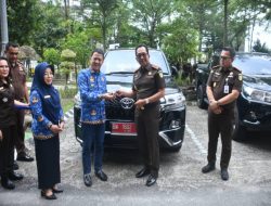 Pj Bupati Kampar Terima Pengembalian Aset Pemda Kampar Dari Kejati Riau.