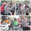 Semarak Merah Putih Sambut HUT RI ke-80 Polisi Berbagi 3.600 Bendera dan 83 Helm di Surabaya