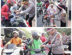 Semarak Merah Putih Sambut HUT RI ke-80 Polisi Berbagi 3.600 Bendera dan 83 Helm di Surabaya