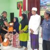 Mayor Inf Hendhi Bagikan Bansos Sembako untuk Warga dalam Rangka HUT TNI ke-80