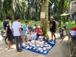 Pengambilan Paket di Simpang PT Subur Harum Makmur Berlangsung Tertib dan Lancar