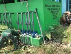 Karya Bakti Babinsa Dukun Dukung Ketahanan Pangan Melalui Pembersihan Saluran Irigasi