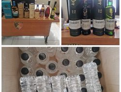 Polsek Pakal Ungkap Penjualan Miras Ilegal di Lakarsantri, Puluhan Botol Arak Bali Diamankan