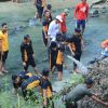 Gerakan Indonesia ASRI : Polres Ngawi Bersihkan Aliran Sungai di Jembatan Purba